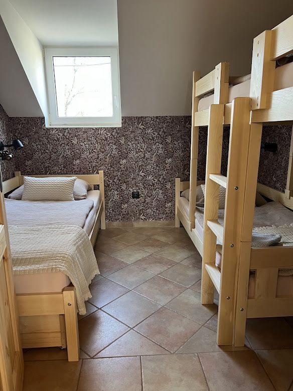 Children's bedroom with bunk bed in U Krčků apartment — family lodging Zaječí